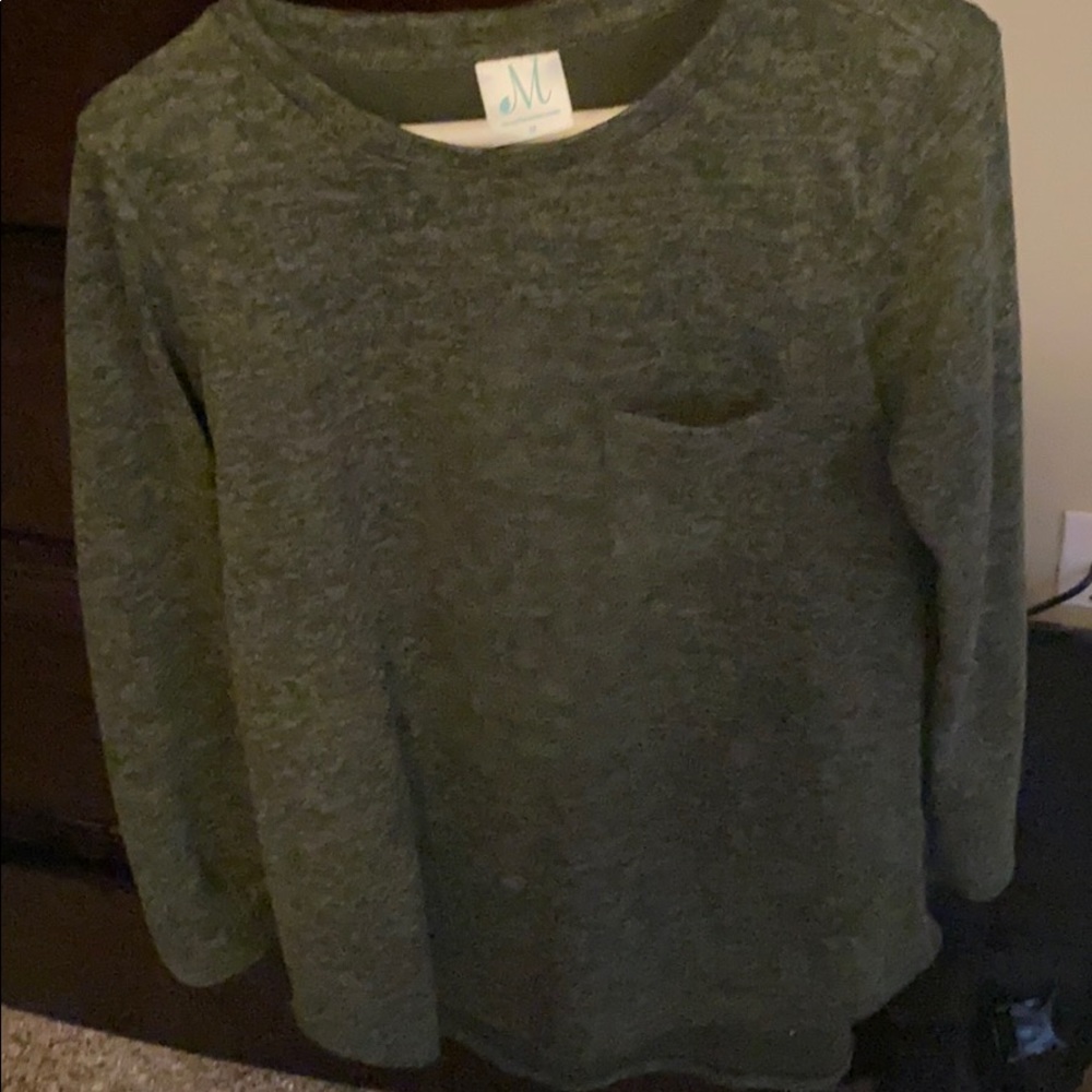 Green shirt sweater
